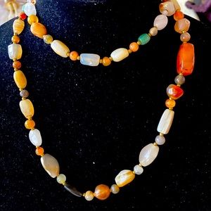 NWOT. Semi precious stones long necklace.